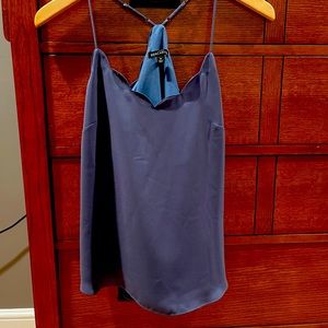 Looks great with white jeans. Adjustable straps